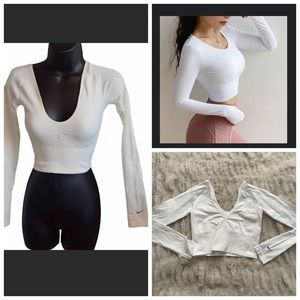 Nike White Long Sleeve Crop Athletic Top.